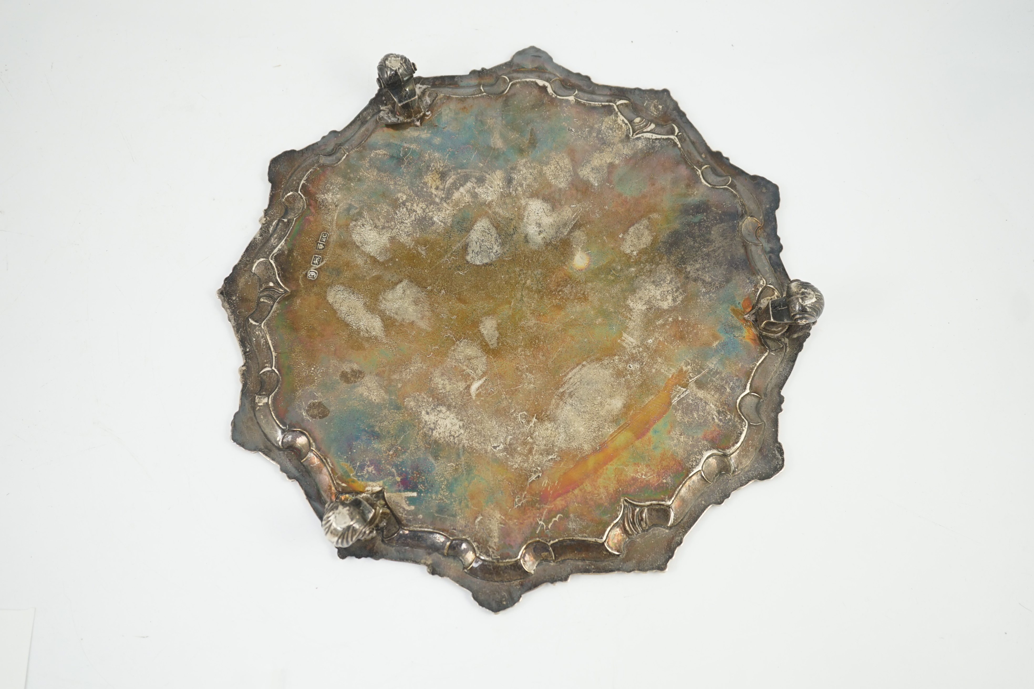 An early George II silver salver, by Ebenezer Coker